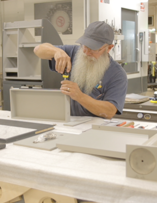 Liberty Partners craftsman hand-assembling VIP aircraft interior components at the Okmulgee, Oklahoma manufacturing facility
